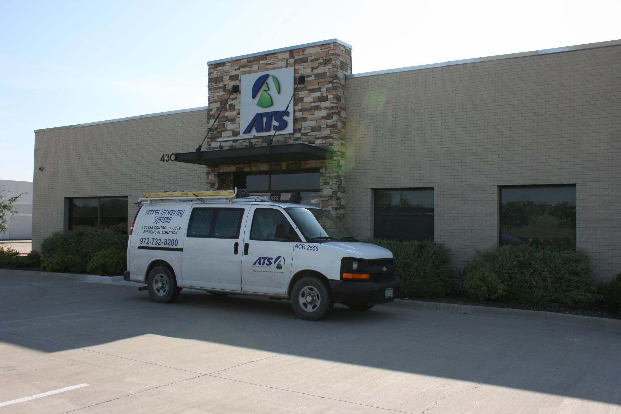 ATS Carrollton headquarters with branded service van out front